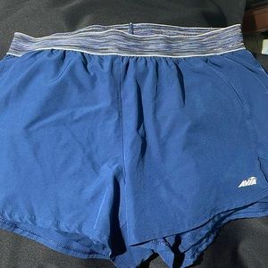 AVIA shorts, have been worn by in very good quality. Navy blue color.